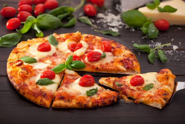 istock Garden Fresh Veggie Pizza with Ingredients 1132169141