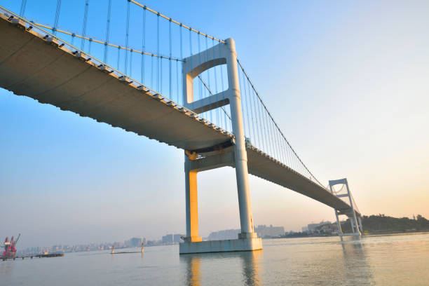 istock Urban traffic bridge on the water 1132173056