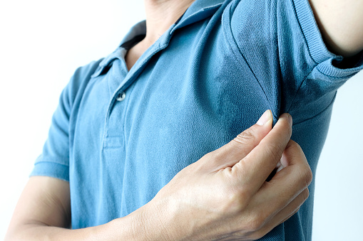 Men wear white sleeves, arms are covered with armpits, Sweat are unclean and unclean. Health care concept