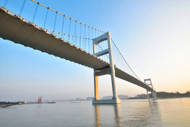 istock Urban traffic bridge on the water 1132173200