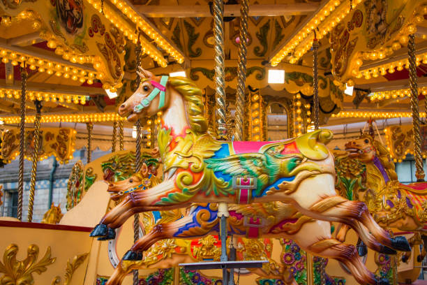 istock Colorful horse carousel at an amusement park. 1132175247