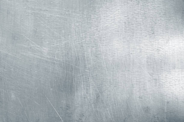 istock Worn steel sheet background, light metal texture with scratches and dents 1132176925