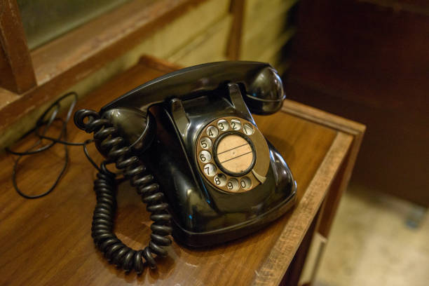 istock Vintage phone on a wooden table 1132177581