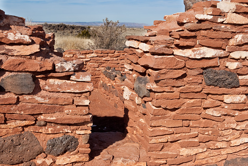 Nearly a thousand years ago natives inhabited the plains between the Painted Desert and the San Francisco Peaks of Arizona. In an area so dry it would seem impossible to live, they built pueblos, harvested rainwater, grew crops and raised families. Today the remnants of their villages dot the landscape. Nalakihu Pueblo is in Wupatki National Monument, established in 1924 to preserve this rich heritage. Wupatki National Monument is near Flagstaff, Arizona, USA.