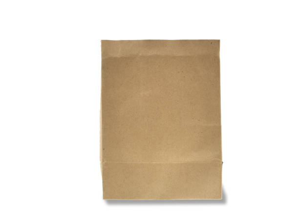istock Brown paper bag isolated on white background. 1132181341
