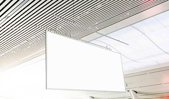 Blank billboard hanging from the ceiling.