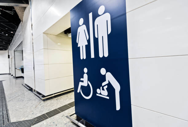 istock Blue public restroom sign on the wall 1132184943