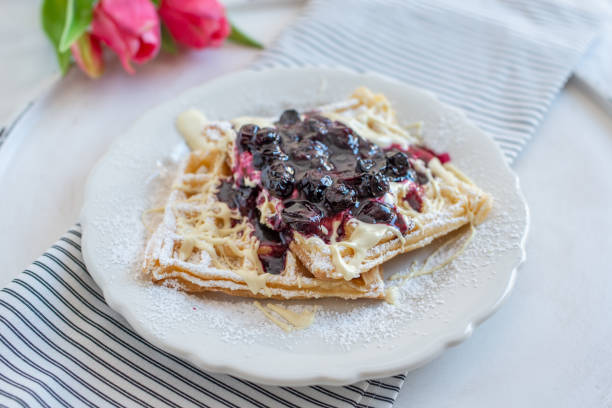 Waffles with blueberries Waffles with blueberries amerikanische heidelbeere stock pictures, royalty-free photos & images