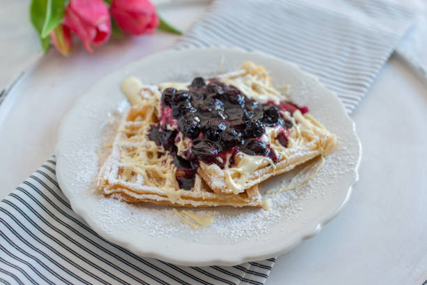 Waffles with blueberries Waffles with blueberries amerikanische heidelbeere stock pictures, royalty-free photos & images