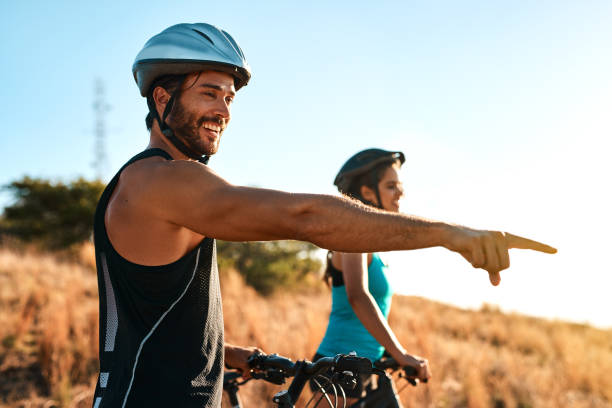istock Mountain bikers breathe in fresh air, not pollution 1132190538
