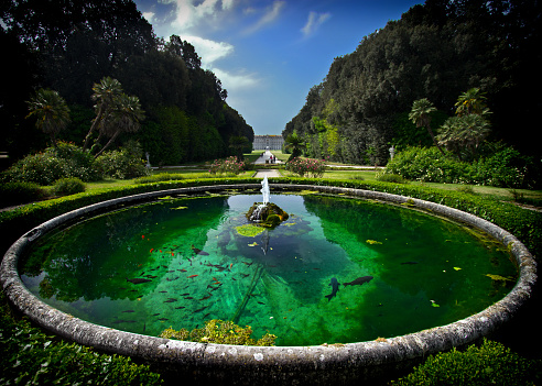 Caserta, Campania / Italy - April 26: Fish swim in a fountain at the Royal Palace on April 26, 2013 in Caserta.