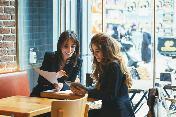 istock Modern business people working at a cafe 1132194739