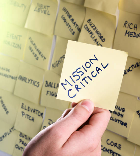 istock Hand holds adhesive note 