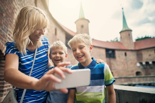 istock Mother and kids visiting Cracow, Poland 1132198613