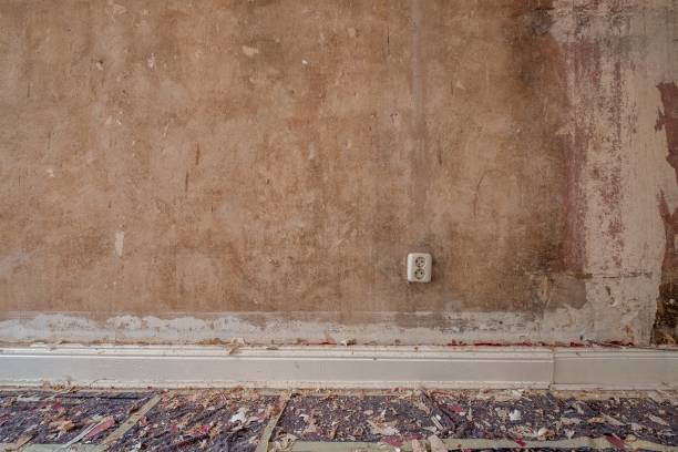 istock vintage plaster wall texture during home renovation with old electric plug socket 1132199151