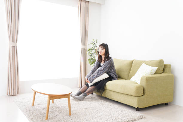 istock Young women relaxing at home 1132200121