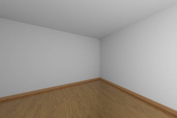 istock Empty white room dark corner with brown wood parquet floor. 1132201418