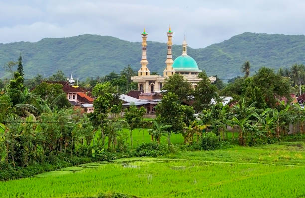 Lombok, Indonesia-January 10, 2018: Mosque by the road. The majority of the population of Indonesia is Muslim, so the country has built many mosques, which are regularly visited by all Muslims.