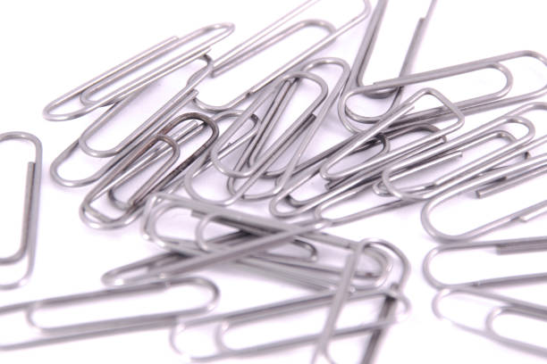 istock many paper clips metal clip on the white background 1132205630
