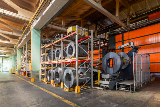 istock Tiered rack with sheet metal rolls. Internal warehouse of raw materials 1132205850