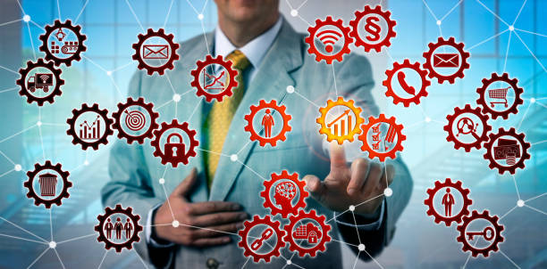 istock Man Initiating Growth Icon In Virtual Gear Train 1132207847