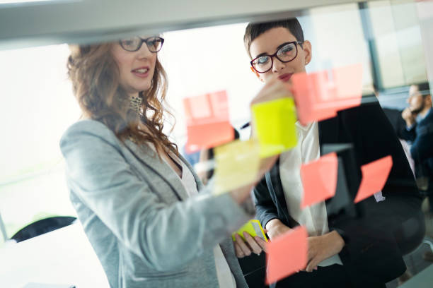 istock Business people meeting at office and use post it notes to share idea 1132209129