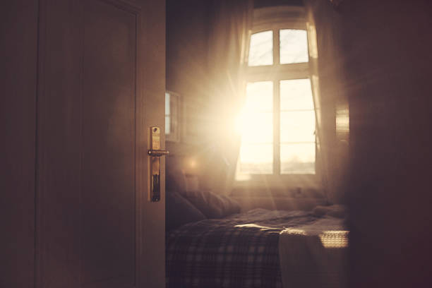istock View into the sunny bedroom in the back light 1132209272