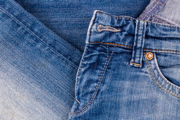 Blue jeans fabric. Denim jeans texture or denim jeans background.
