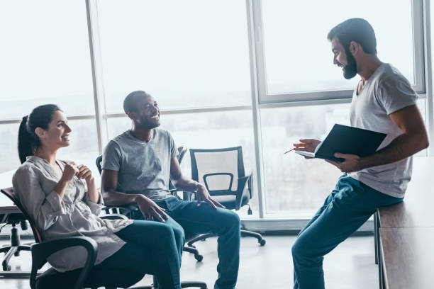 istock Young professional team discussing business plan in the office 1132210654