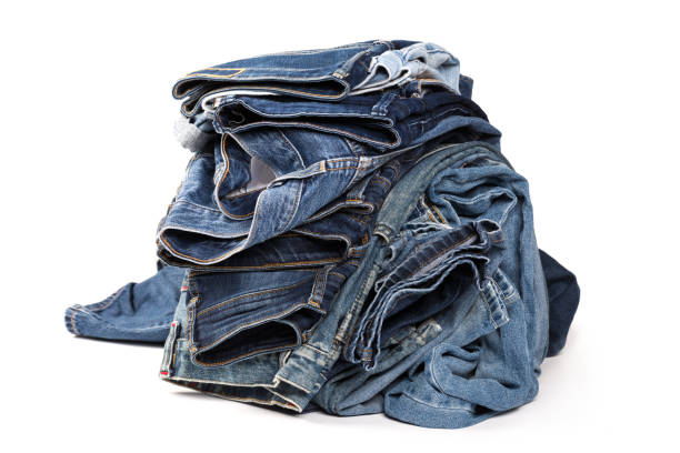 istock Blue jeans isolated on white background, jeans stacked 1132210966