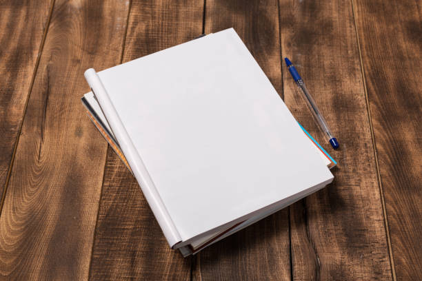 istock Mock-up magazine or catalog on wooden table. Blank page or notepad on wood background. Blank page or notepad for mockups or simulations 1132211618