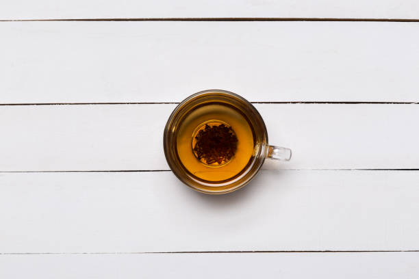 istock cup of tea on a white wooden background 1132211692