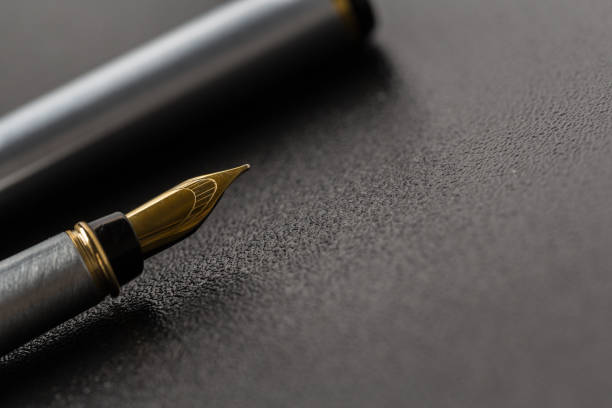 istock Fountain pen with clipping path on black background 1132211746