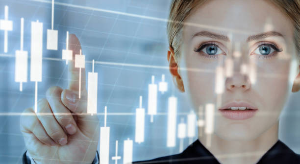 istock Businesswoman  analyzing growth chart on digital display 1132211922