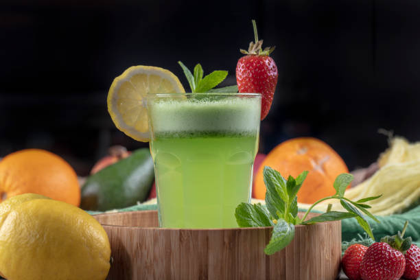 istock Lemonade with kiwi, green basil, grapefruit syrup and ice, selective focus. 1132211954