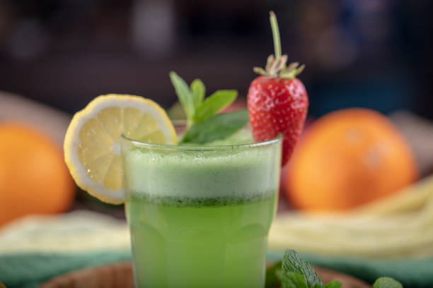 istock Lemonade with kiwi, green basil, grapefruit syrup and ice, selective focus. 1132213201