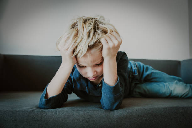 istock sad child, stress and depression, anxiety, feeling weak and tired 1132213696
