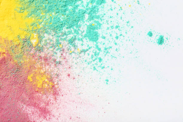 istock Colorful holi powders on white background 1132214730