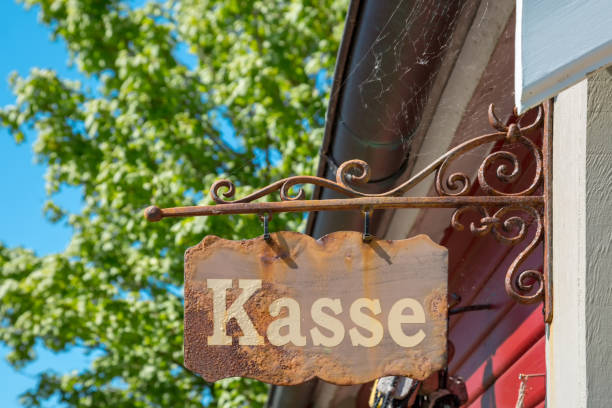 istock Rusty sign on a wall with the inscription Kasse (cash box) 1132219731