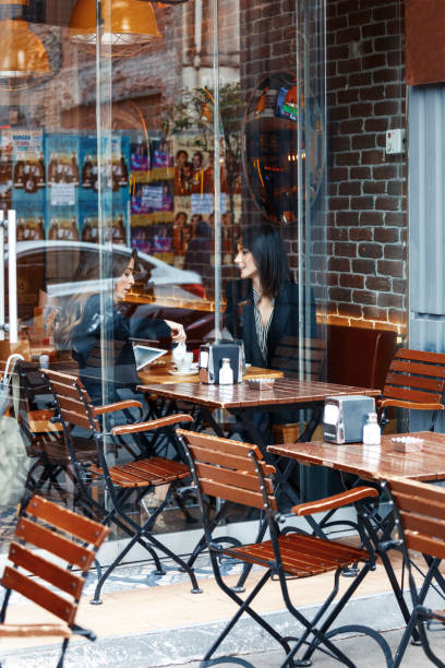 istock Modern business people working at a cafe 1132223808