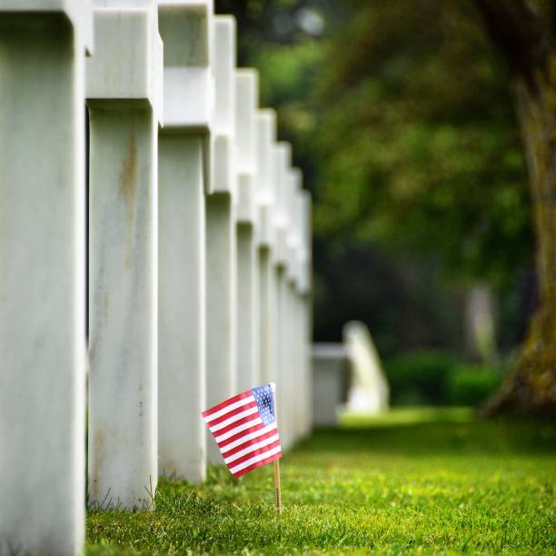istock US Flag at military cemetery 1132224399