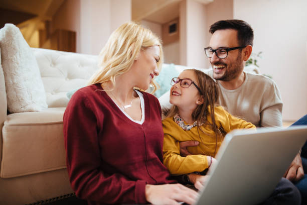 istock Family using laptop at home 1132224524