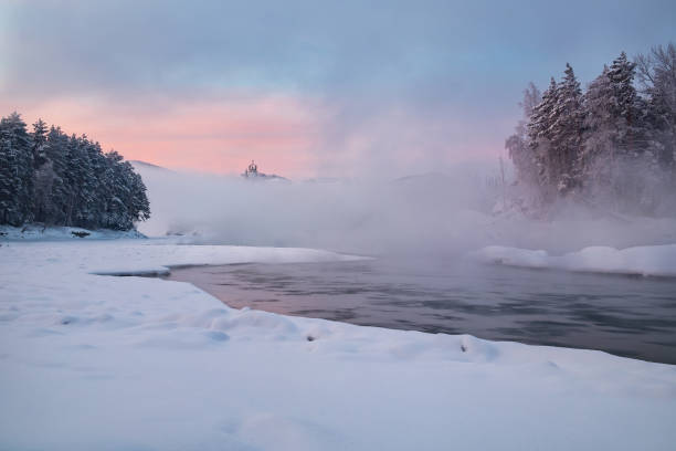 istock Siberian winter river and castle at down 1132224686