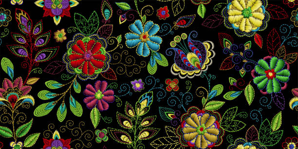 istock Embroidery seamless pattern with beautiful flowers. Vector handmade floral ornament on dark background. Embroidery for fashion products. Elegant tiled design, best for print fabric or papper and more 1132225264