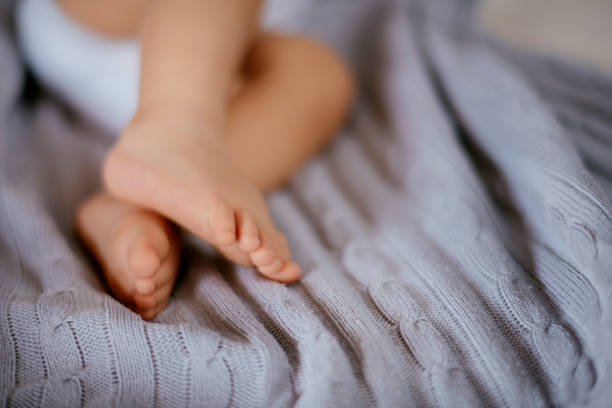 istock Baby leg fingers 1132227702