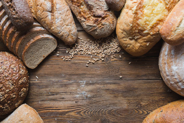 istock Still life with breads and wheats 1132228119