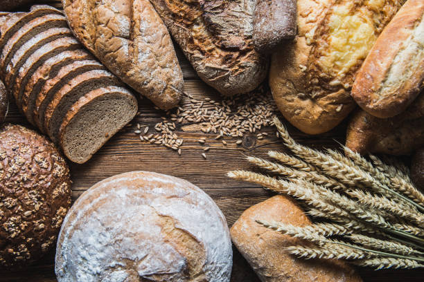 istock Still life with breads and wheats 1132228157