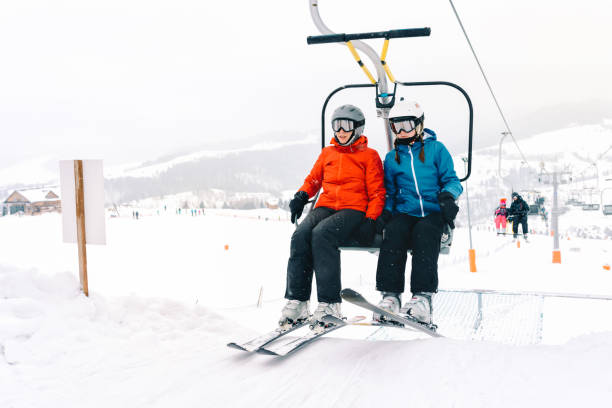 istock Ski, skiing - skiers on ski lift 1132228860