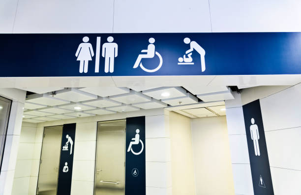 istock Blue public restroom sign on the wall 1132230648