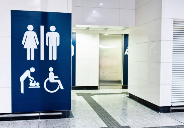 istock Blue public restroom sign on the wall 1132230726